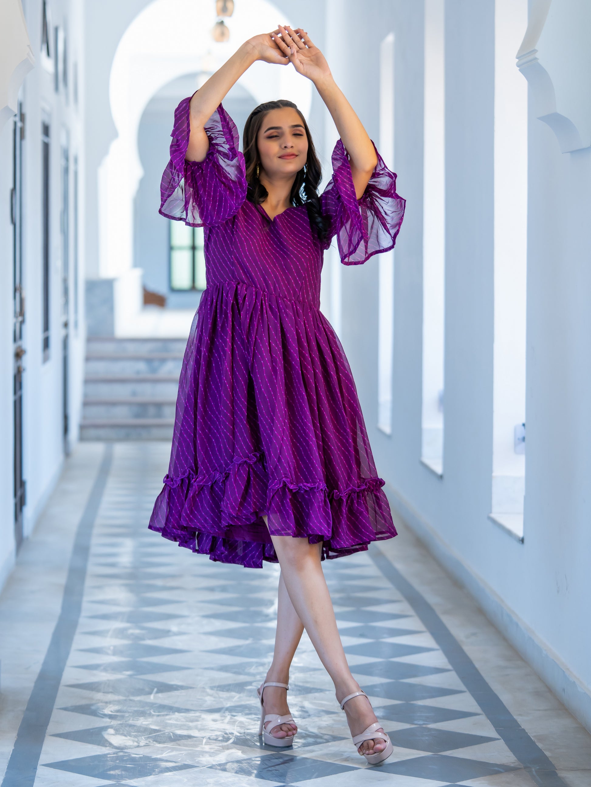 Purple Leheriya Print Ethnic Dress with Bell Sleeves & Flared Silhouet The Aspora Purple Leheriya Print Ethnic Dress with Bell Sleeves & Flared Silhouet The Aspora