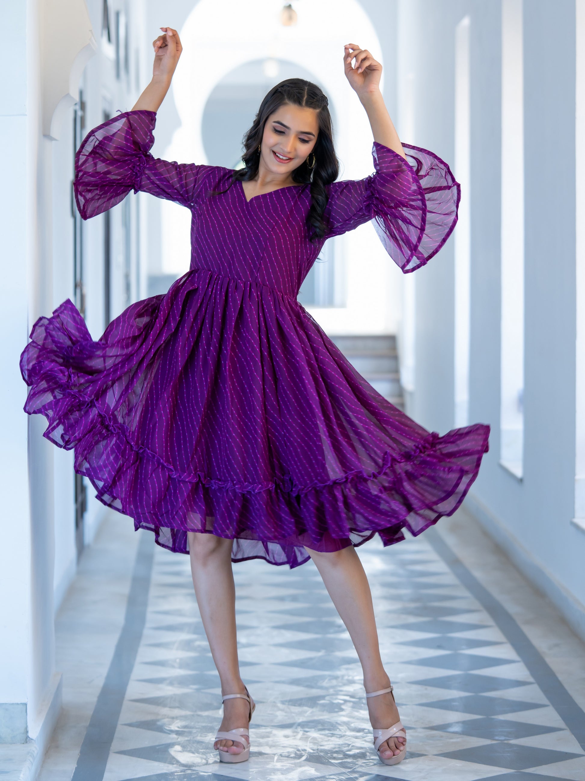 Purple Leheriya Print Ethnic Dress with Bell Sleeves & Flared Silhouette Purple Leheriya Print Ethnic Dress with Bell Sleeves & Flared Silhouette