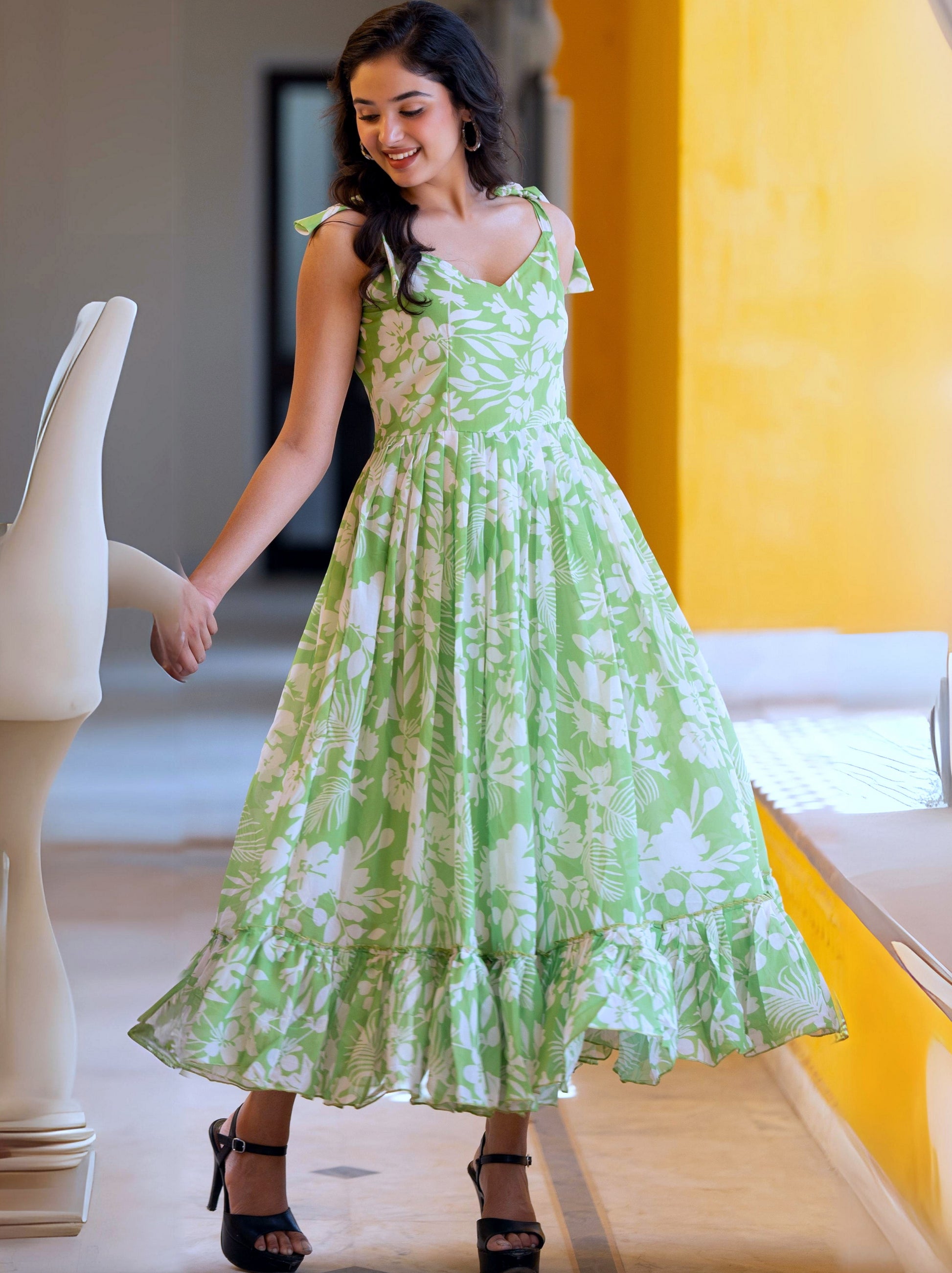 Light Green Floral Maxi Dress with Tie-Up Shoulders & Flared Silhouette Light Green Floral Maxi Dress with Tie-Up Shoulders & Flared Silhouette